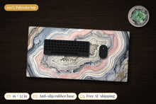 Load image into Gallery viewer, Geode Gate Ink &amp; Ore Desk Mat, 16 x 32 in, on a dark desk
