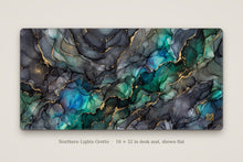 Load image into Gallery viewer, Northern Lights Grotto desk mat shown flat, 16 x 32 in
