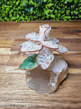 Load image into Gallery viewer, Handcrafted Chip Flower on Quartz
