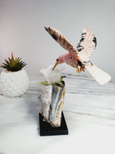 Load image into Gallery viewer, Peruvian Rhodonite Hummingbird on Quartz Cluster Base On White Jade Flower with Serpentine Leaves
