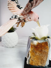 Load image into Gallery viewer, Peruvian Rhodonite Hummingbird on Quartz Cluster Base On White Jade Flower with Serpentine Leaves
