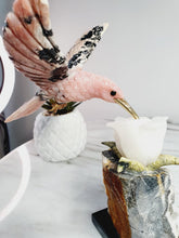 Load image into Gallery viewer, Peruvian Rhodonite Hummingbird on Quartz Cluster Base On White Jade Flower with Serpentine Leaves
