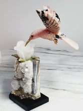 Load image into Gallery viewer, Peruvian Rhodonite Hummingbird on Quartz Cluster Base On White Jade Flower with Serpentine Leaves
